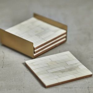 Brand new in box - set of 4 ribbed bone coasters in metal tray